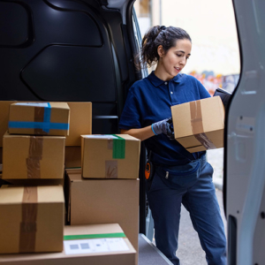 Courier-checking-the-parcel-for-delivery-2.jpg